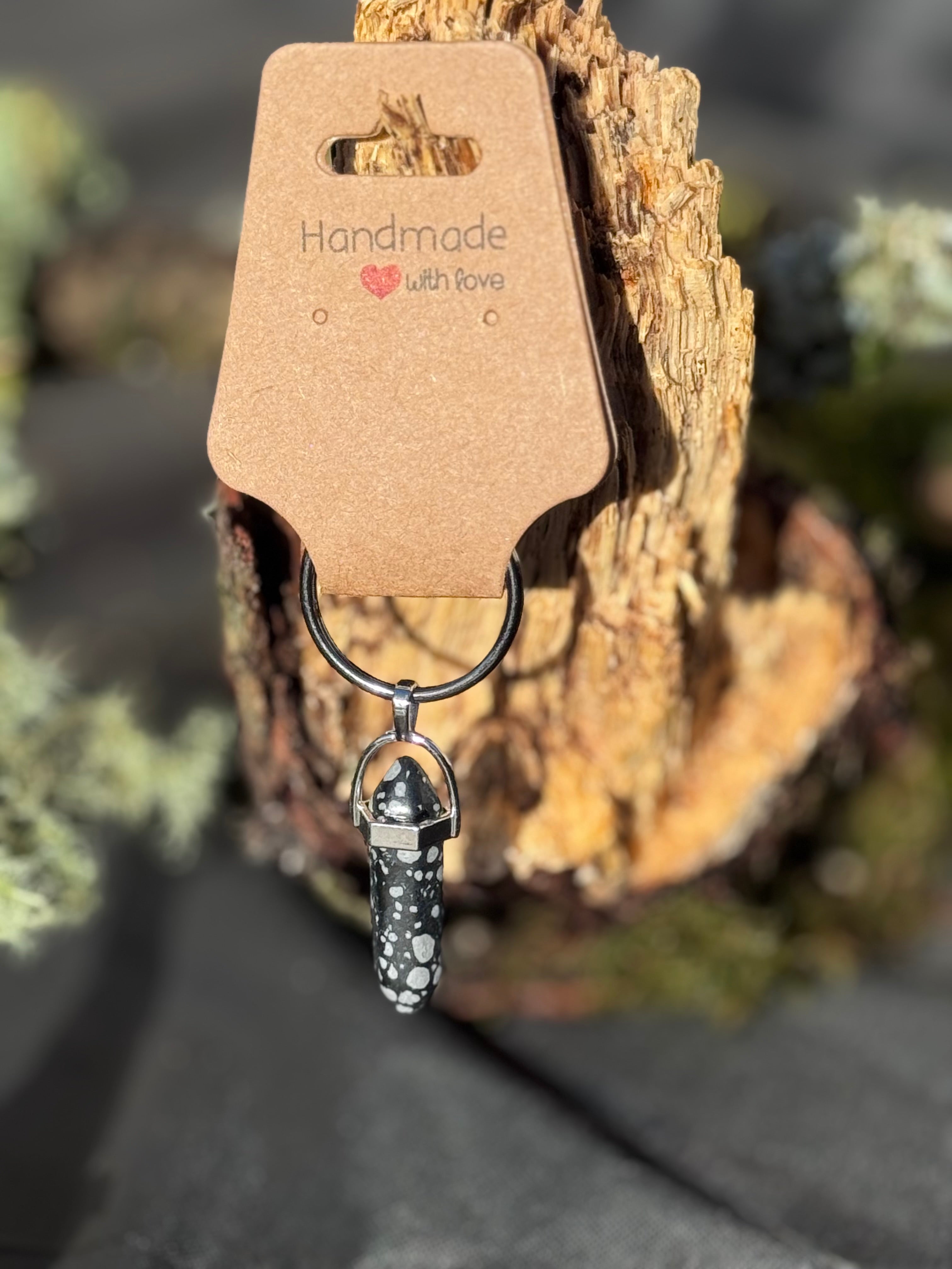 Snowflake Obsidian stone on a keyring or bag charm