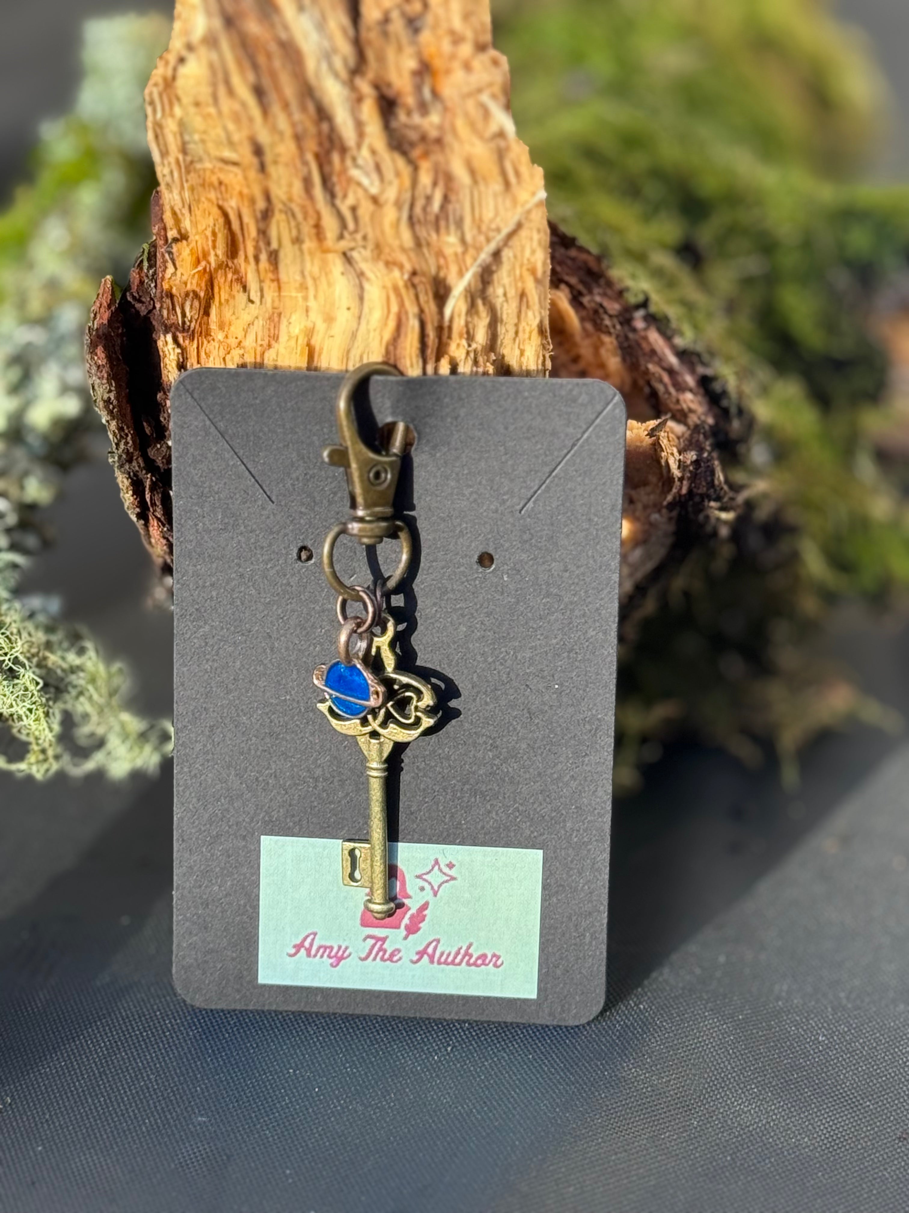 Key and Uranus charm keyring