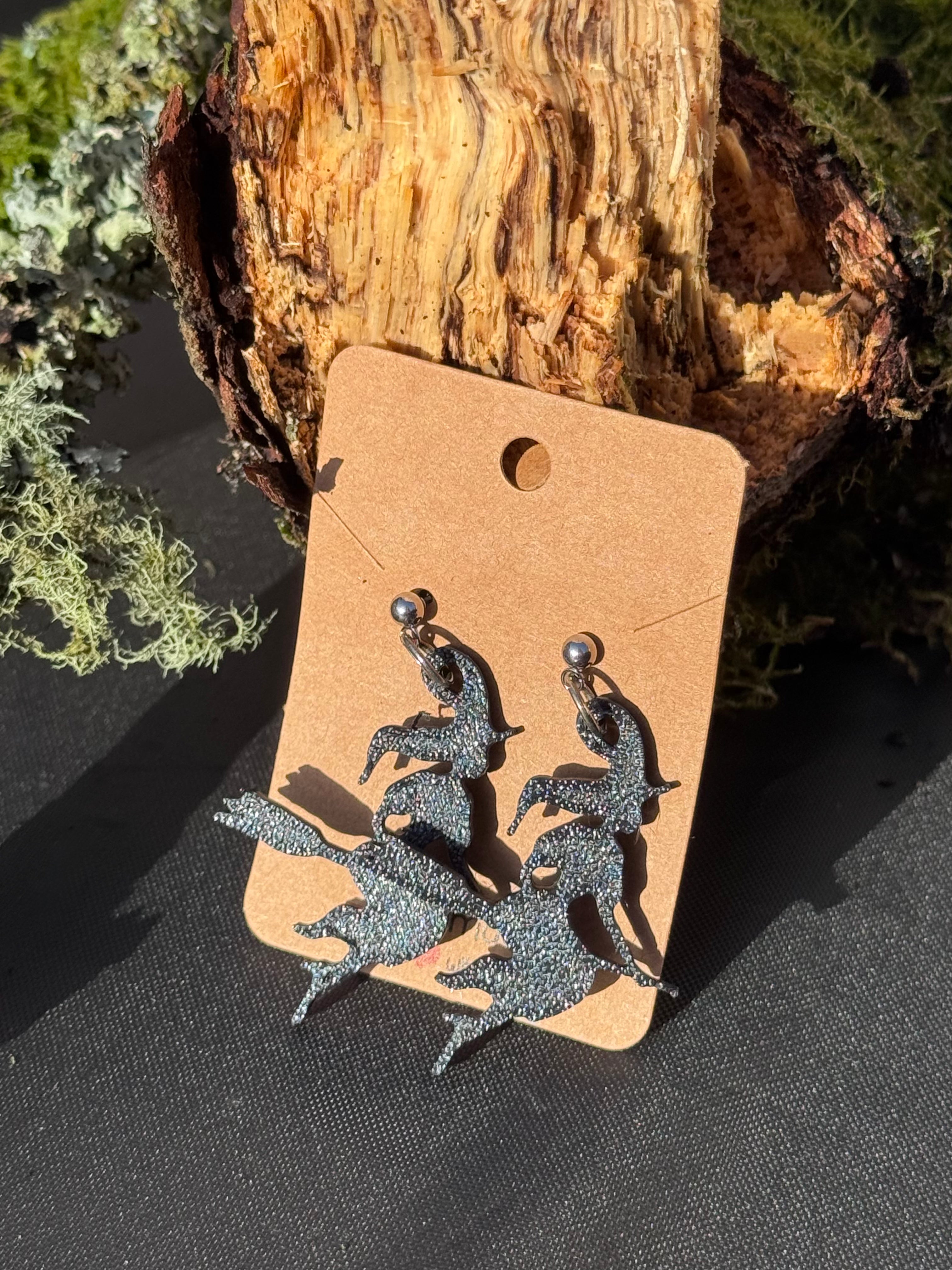 Witch on a broom earrings